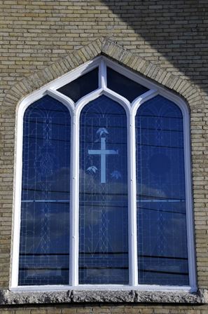 White Cross with Lilies Window, Exterior