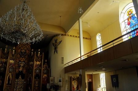 Chandelier, Ornate Screen and Choir Loft